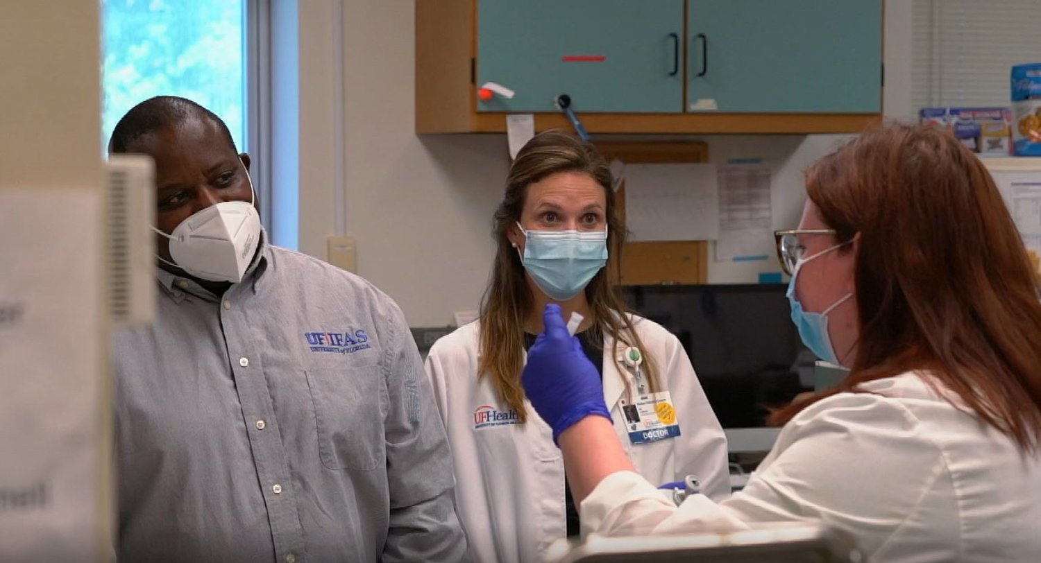 Joseph Larkin, left, Vivian Valcarce Luaces and Lauren Stafford in the lab.
